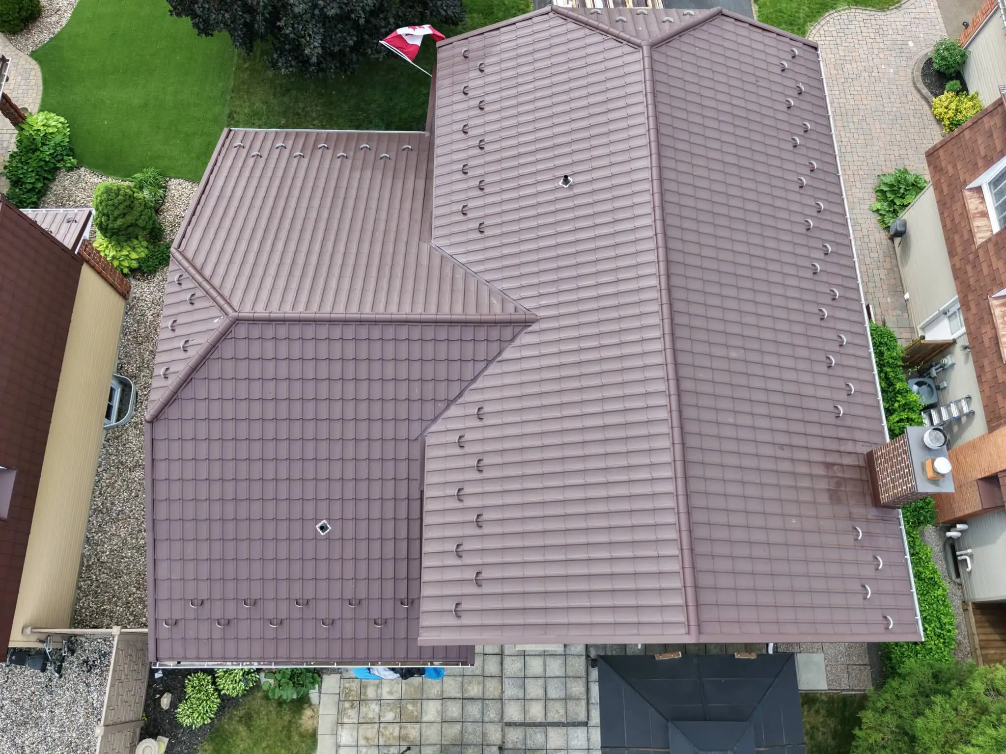 Completed architectural metal roof dormer detail