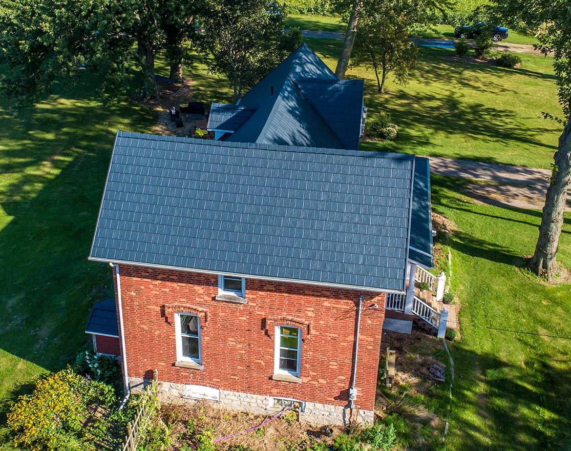 North Ridge Slate metal shingle roof in Granite Grey